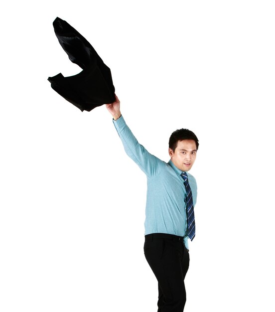 Portrait of Smiling Asian man wearing shirt green Hurling a black suit with his hand showing delight in being successful at work in white background. Concept successful to working.