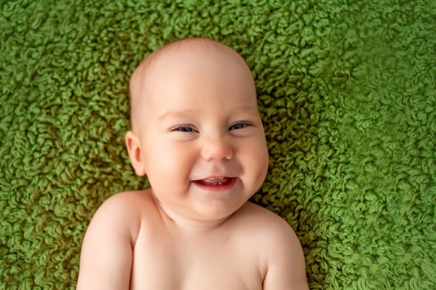 Portrait of a smiling baby boy 6 months old