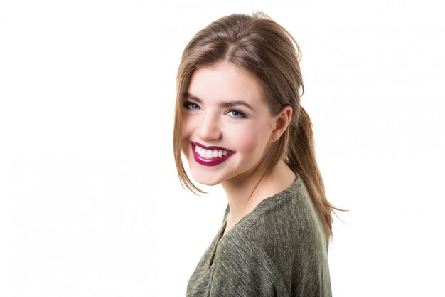 Portrait of a smiling brunette woman.