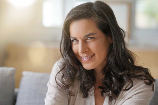 Portrait of smiling brunette woman