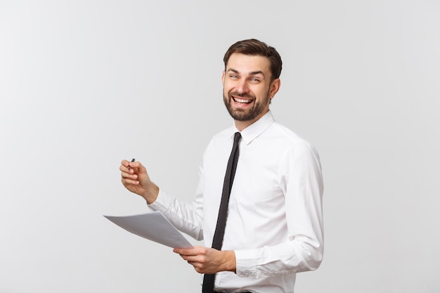 Portrait of a smiling business man with documents isolated on white.