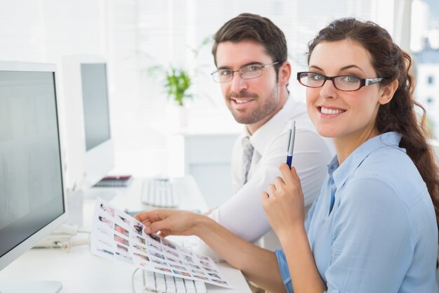 Portrait of smiling business team brainstorming