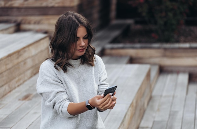 Portrait of a smiling Business woman Using Phone