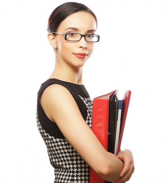 Portrait of smiling business woman with paper folders isolated 