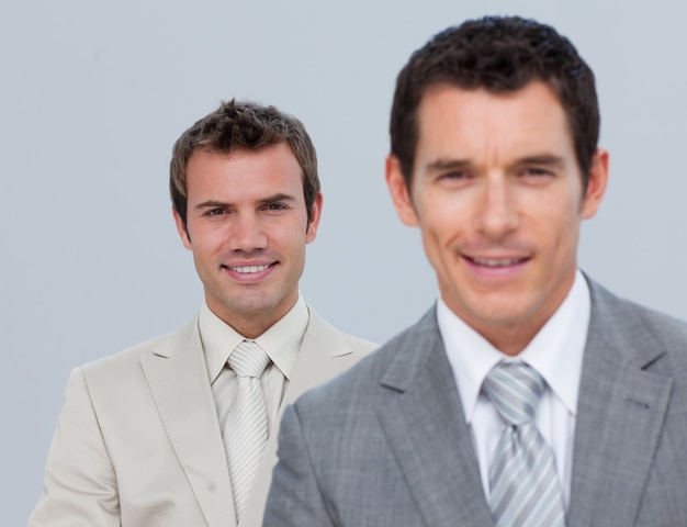 Portrait of smiling businessmen isolated