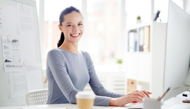 Portrait of smiling businesswoman at office