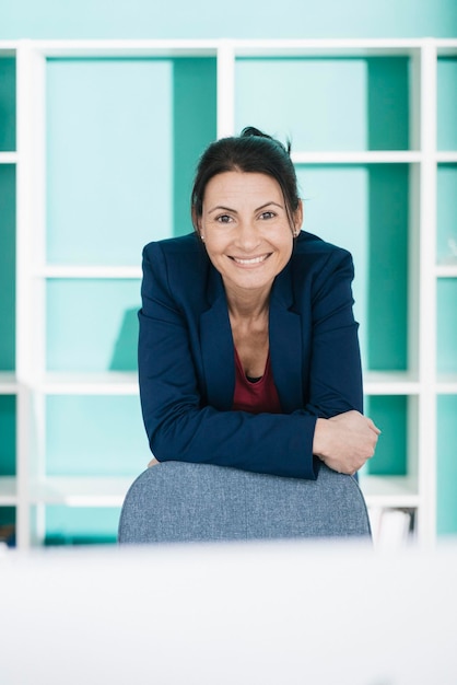 Portrait of smiling businesswoman in office