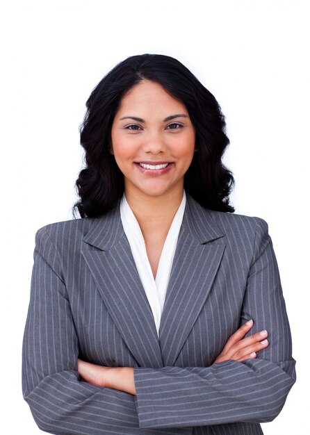 Portrait of a smiling businesswoman with folded arms 