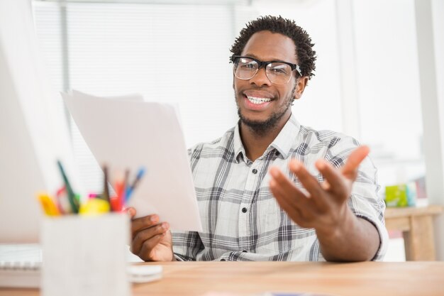 Portrait of smiling casual businessman looking at camera