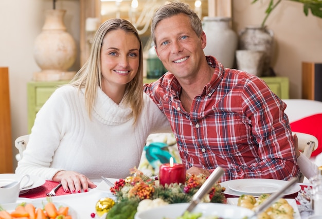 Portrait of a smiling couple embracing