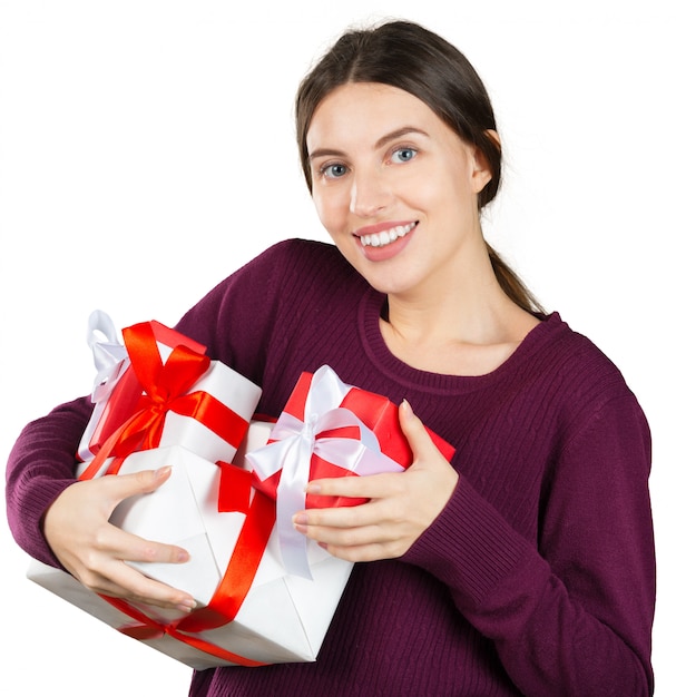 Portrait of a smiling cute woman and gift box