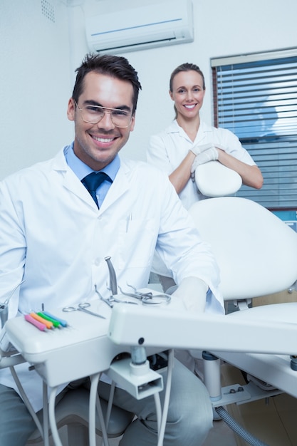 Portrait of smiling dentists