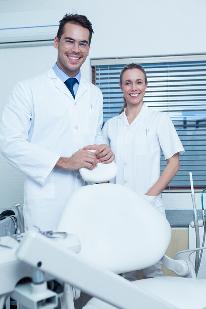 Portrait of smiling dentists