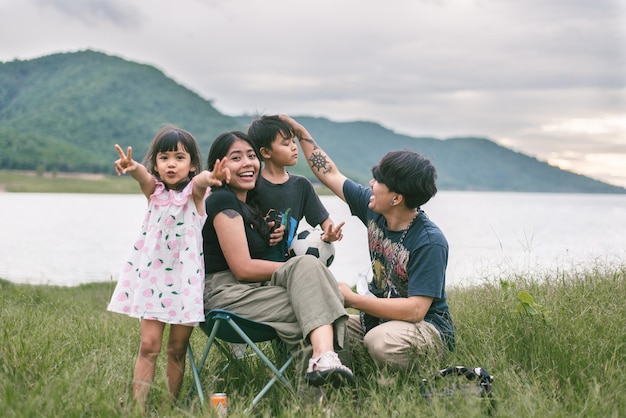 portrait of smiling family on field