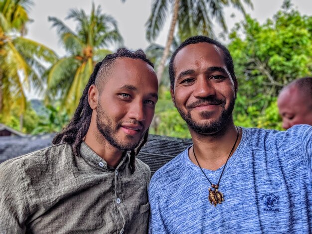 Portrait of smiling friends outdoors