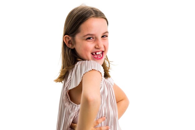 Photo portrait of smiling girl against white background