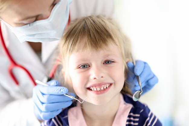 Portrait of smiling girl at dentist appointment