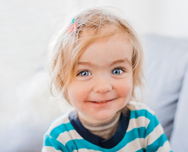 portrait of smiling girl at home