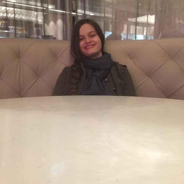 Portrait of smiling girl at restaurant