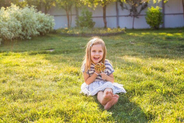 Portrait of a smiling girl standing on field