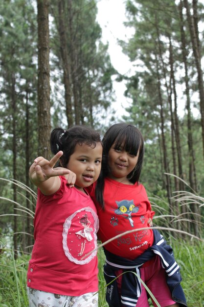 Portrait of a smiling girls in a forest