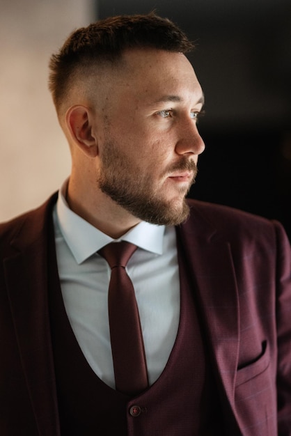 Portrait of smiling groom with beard