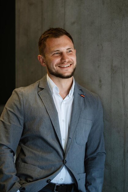 Portrait of smiling groom with beard