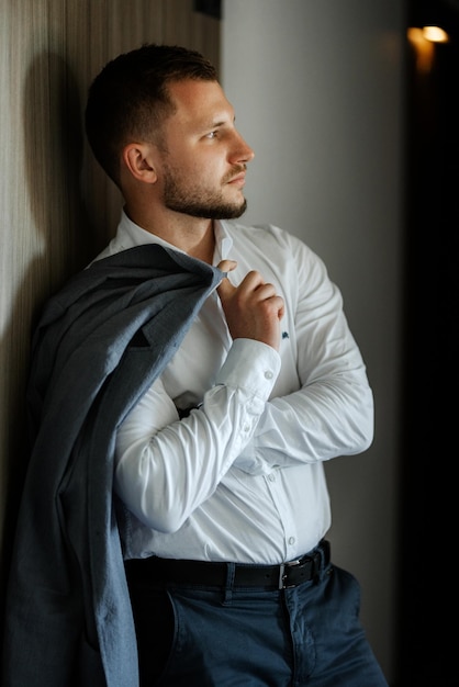 Portrait of smiling groom with beard