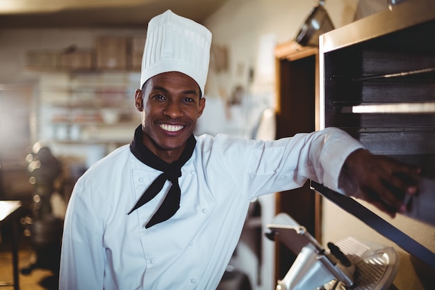 Portrait of smiling head chef