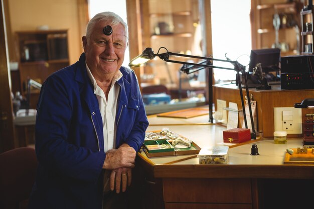 Portrait of smiling horologist