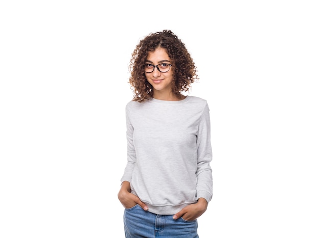 Portrait of a smiling Indian young woman in a jumper 