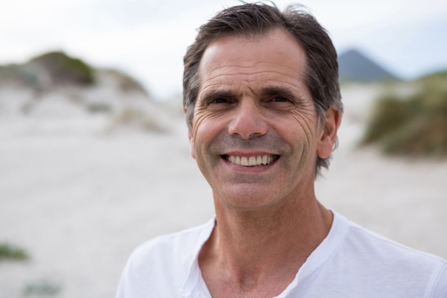 Portrait of smiling man on beach