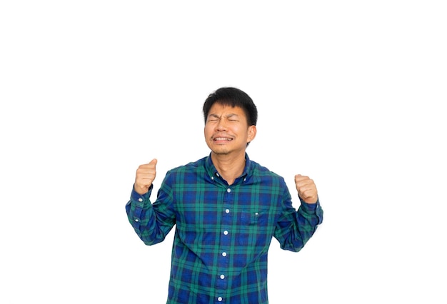 Portrait of smiling man standing against white background