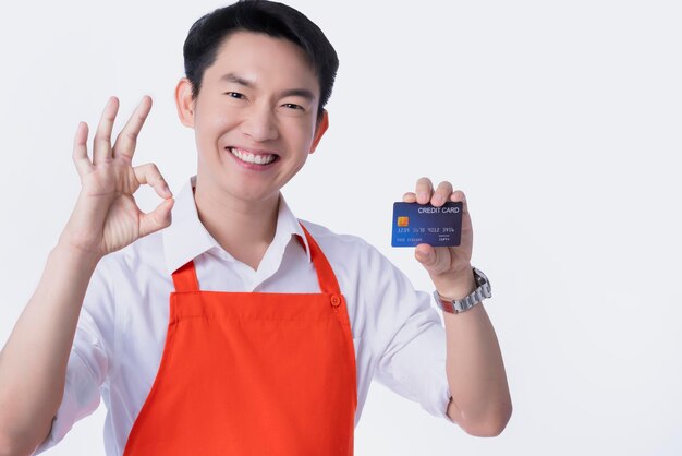 Portrait of smiling man standing against white background