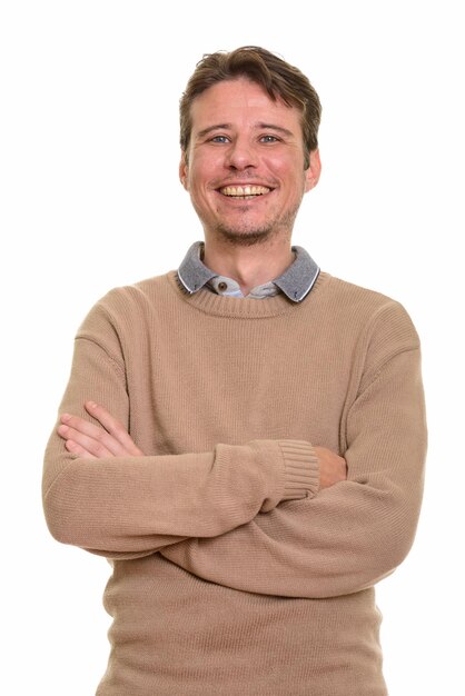 Portrait of smiling man standing against white background