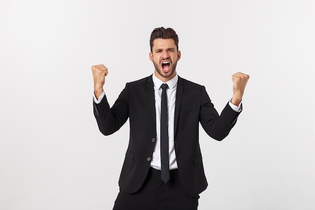 Portrait of smiling man standing against white background