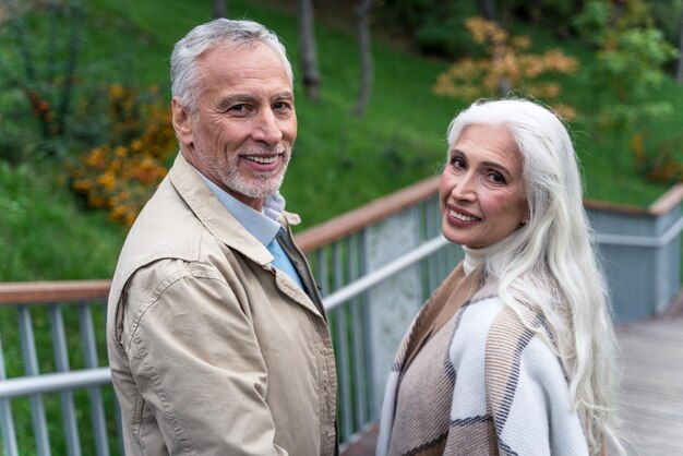 Portrait of smiling man and woman outdoors