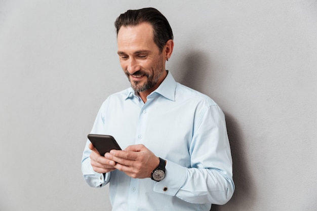 Portrait of a smiling mature man dressed in shirt