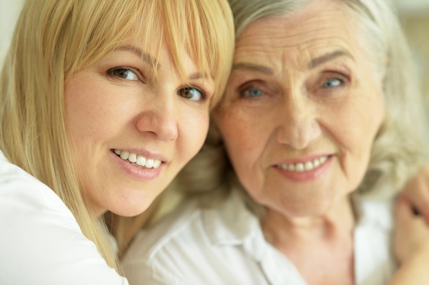 Portrait of smiling mother and daughter