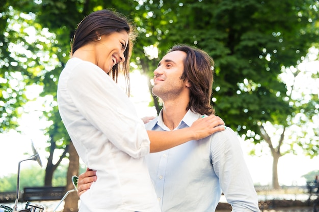 Portrait of a smiling romantic couple hugging