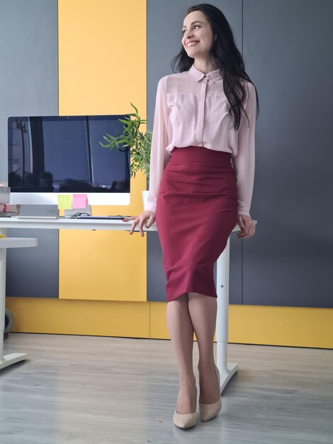 Portrait of smiling successful business woman in office