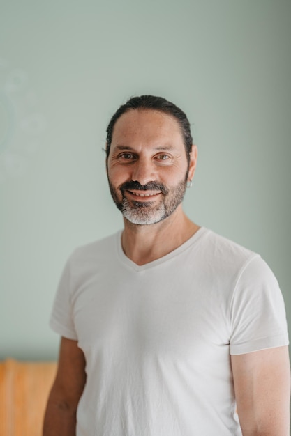 Portrait of a smiling therapist with beard