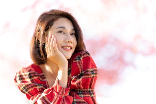 Portrait of a smiling woman asia beautiful model short hair posing