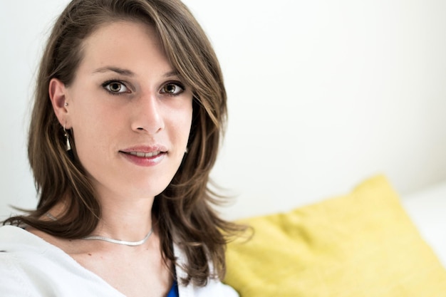 Portrait of smiling woman at home