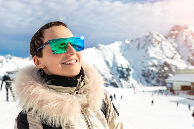 portrait of smiling woman in snow