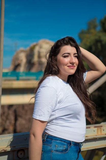 Portrait of smiling woman standing outdoors