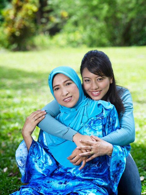 Portrait of smiling woman with mother