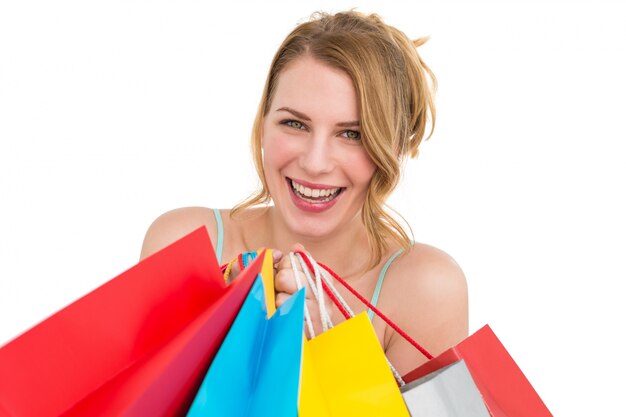 Portrait of a smiling woman with shopping bags 