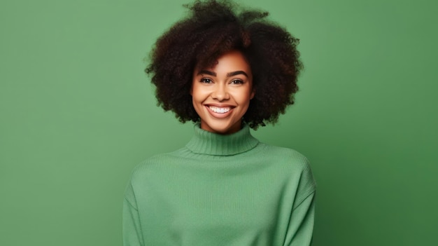 Photo portrait of a smiling young african woman wearing sweater standing isolated over green background