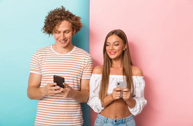 Portrait of a smiling young couple standing